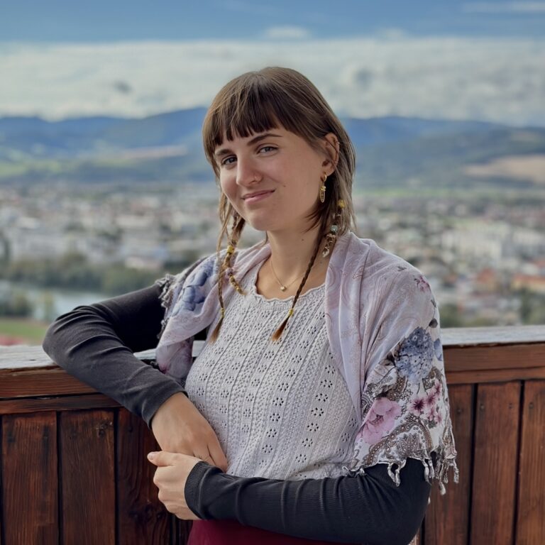 Student posing for a camera