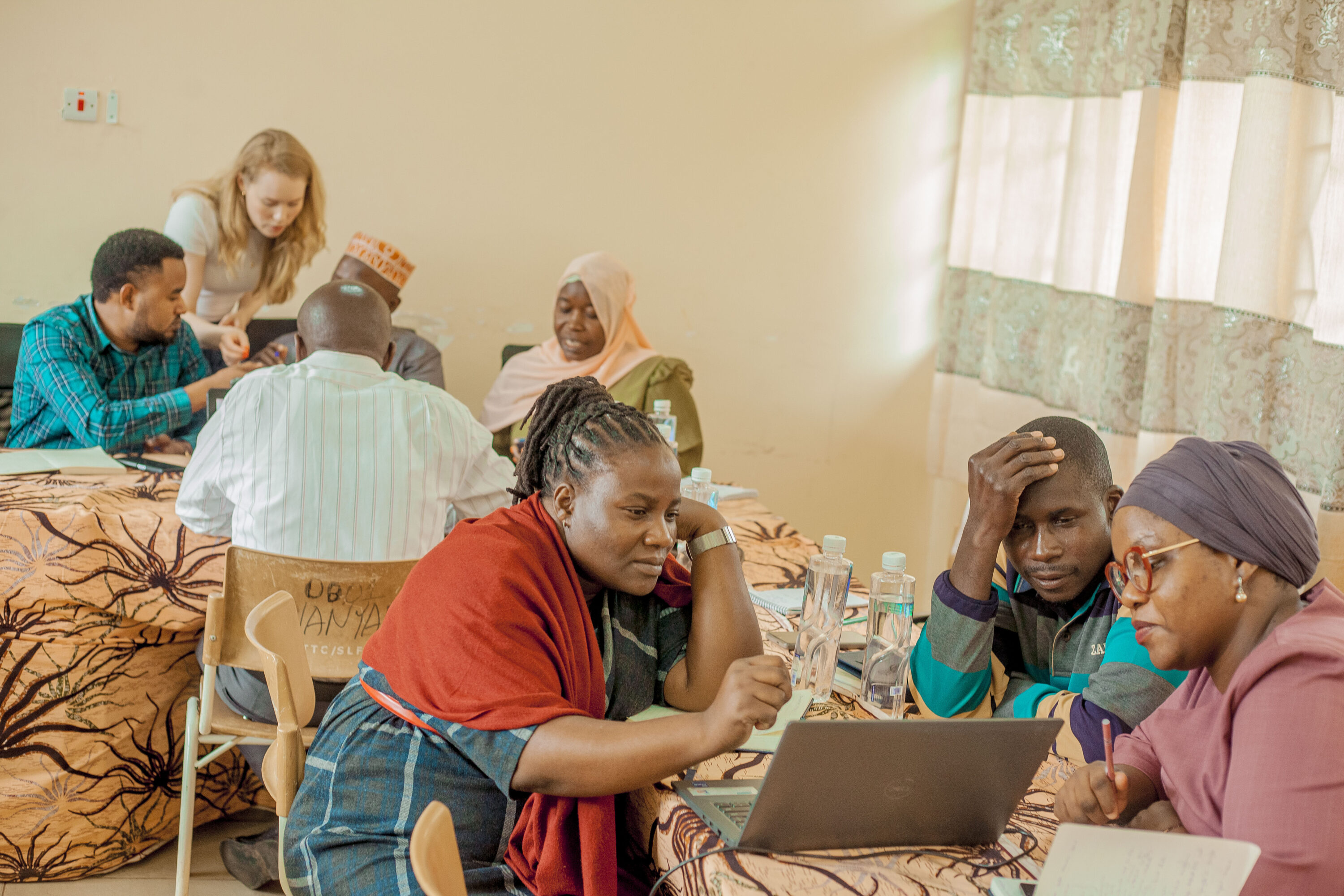 People working together on a laptop