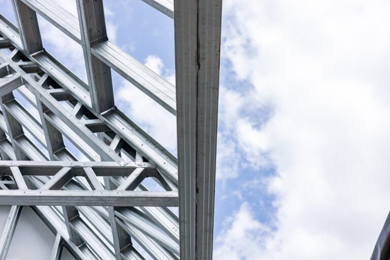 Picture of a building's steel structure against the sky.