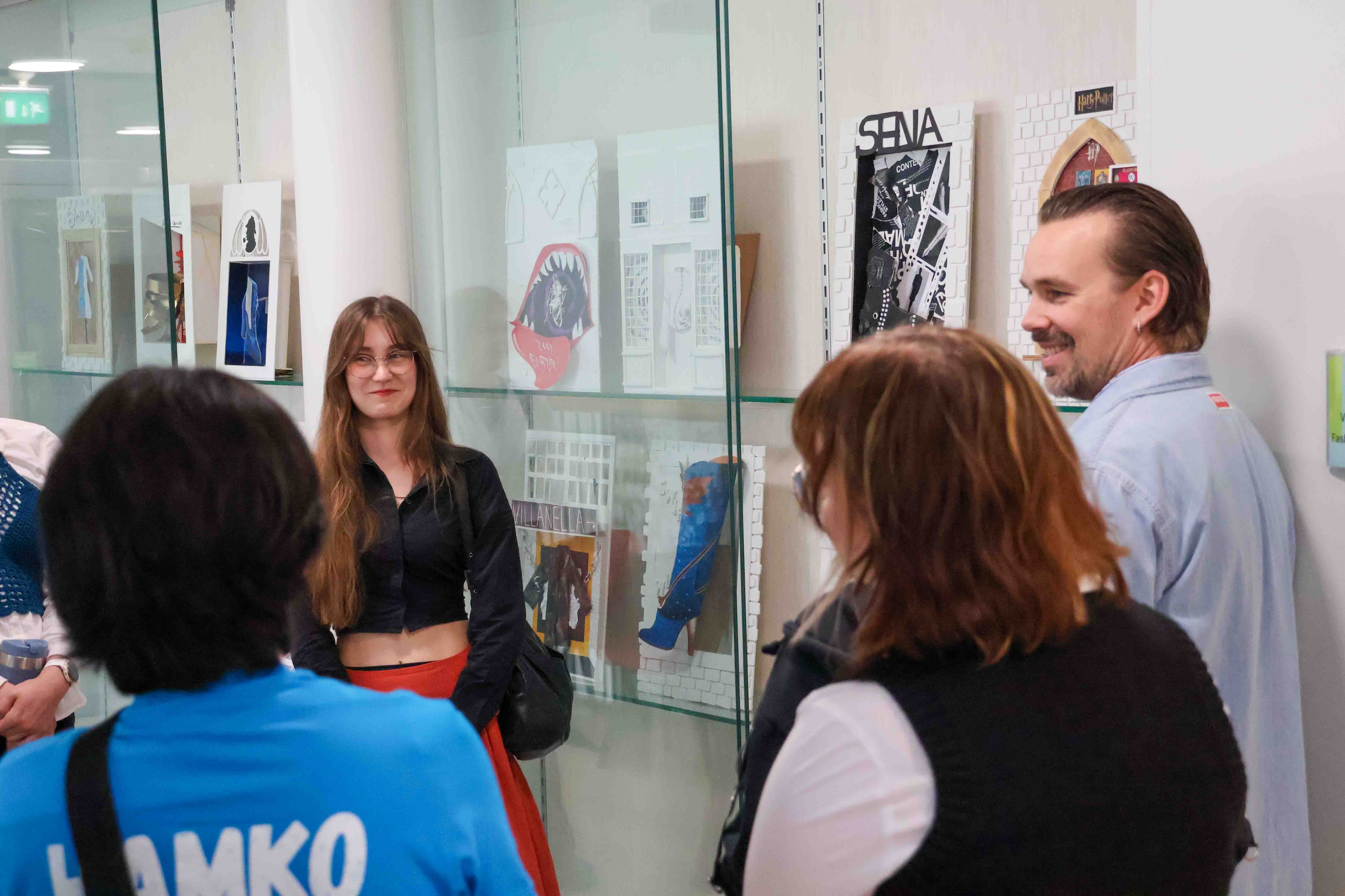 Students showcasing their work for Teemu Muurimäki